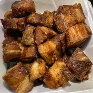 Dinuguan topped with Lechon Kawali